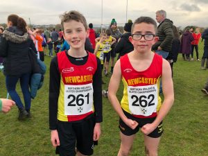 U13 boys Connaire Og and Donal put up a fight over their 2000m race